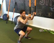 Man performs squat